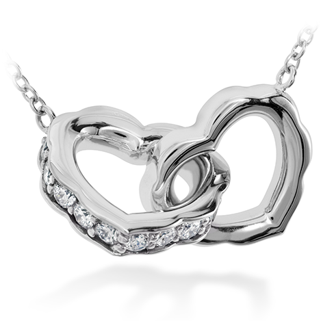 Heart necklace with 2025 diamonds on one side